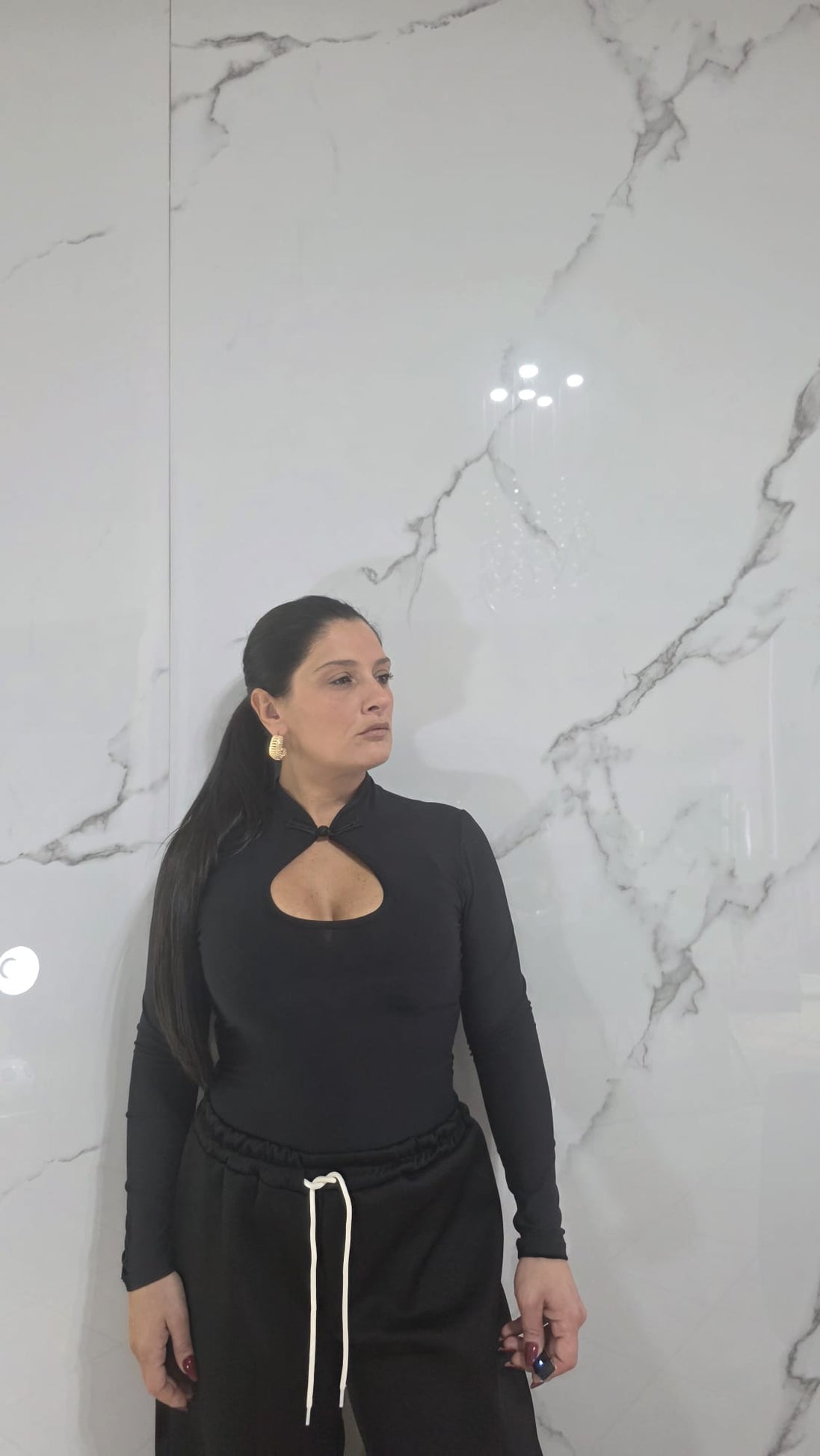 Body Rosso a Maniche Lunghe con Collo Alto e Dettaglio al Centro per Donna Stile Elegante e Comfortabile