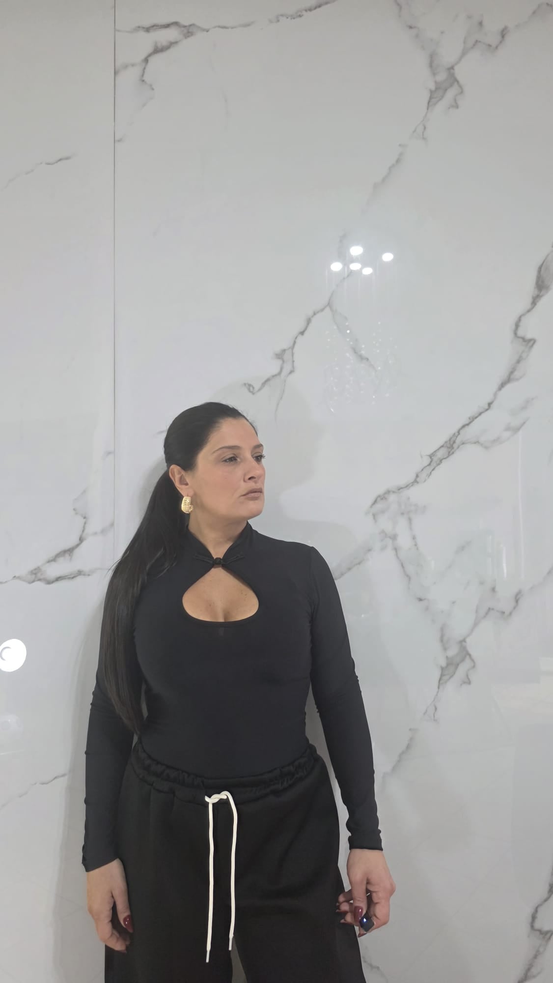 Body Rosso a Maniche Lunghe con Collo Alto e Dettaglio al Centro per Donna Stile Elegante e Comfortabile
