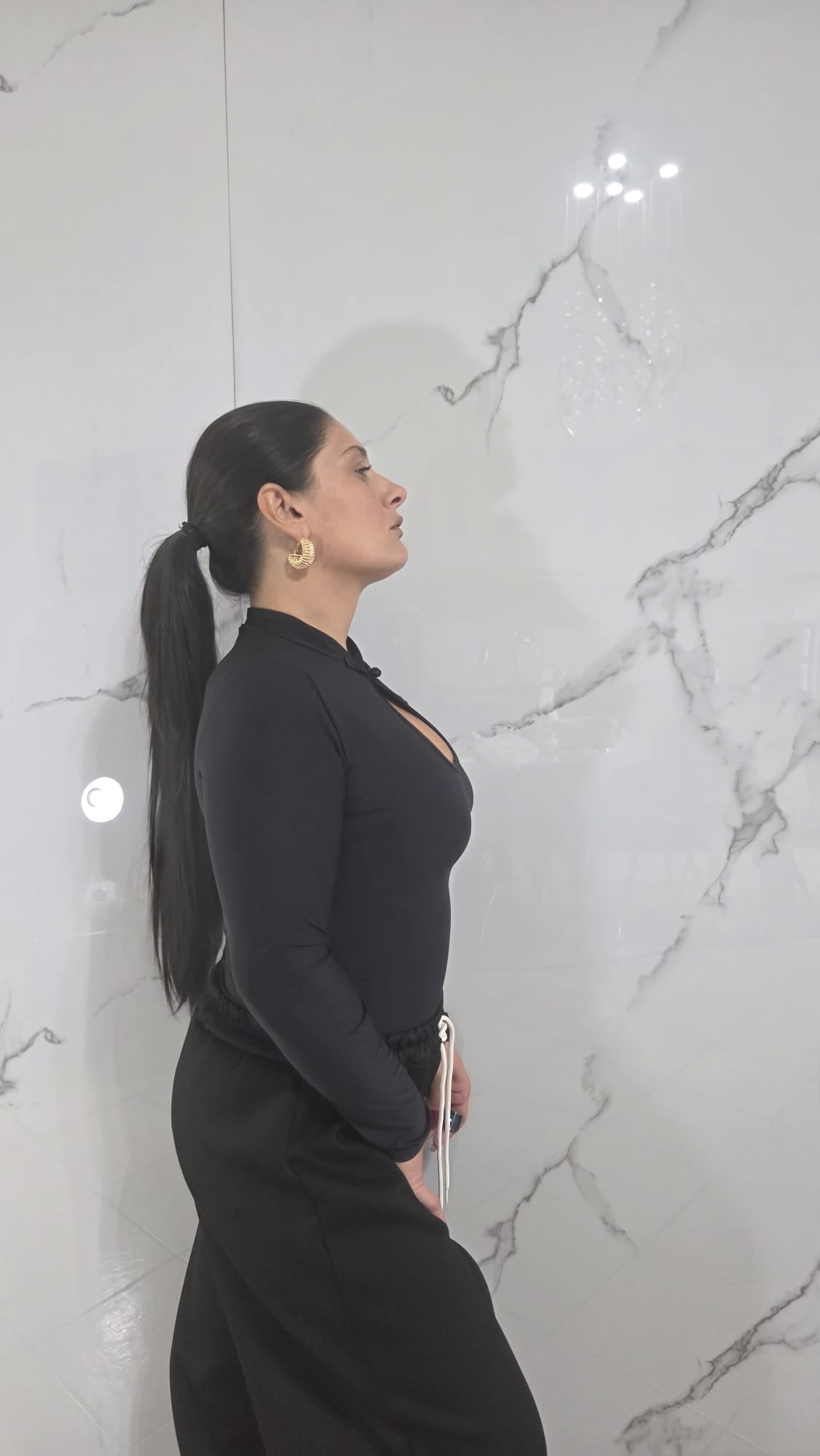 Body Rosso a Maniche Lunghe con Collo Alto e Dettaglio al Centro per Donna Stile Elegante e Comfortabile