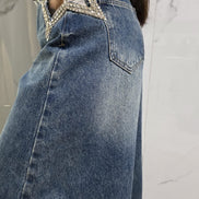 Jeans Oversize con Dettagli in Strass per un Look Elegante e Fashionabile