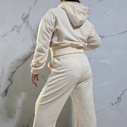 Tuta Completa Donna con Dettagli Glitter in Tessuto Morbido e Confortevole per un Look Elegante e Moderno