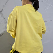 Felpa Gialla con Maniche Lunghe e Collo a V per Donna Comfortabile e Versatile