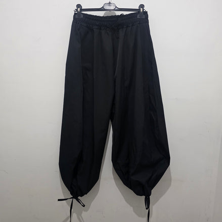 Pantaloni Neri a Gamba Larga con Cordoncino e Fiocco in Tessuto Morbido per Donna Stile Elegante e Comodo