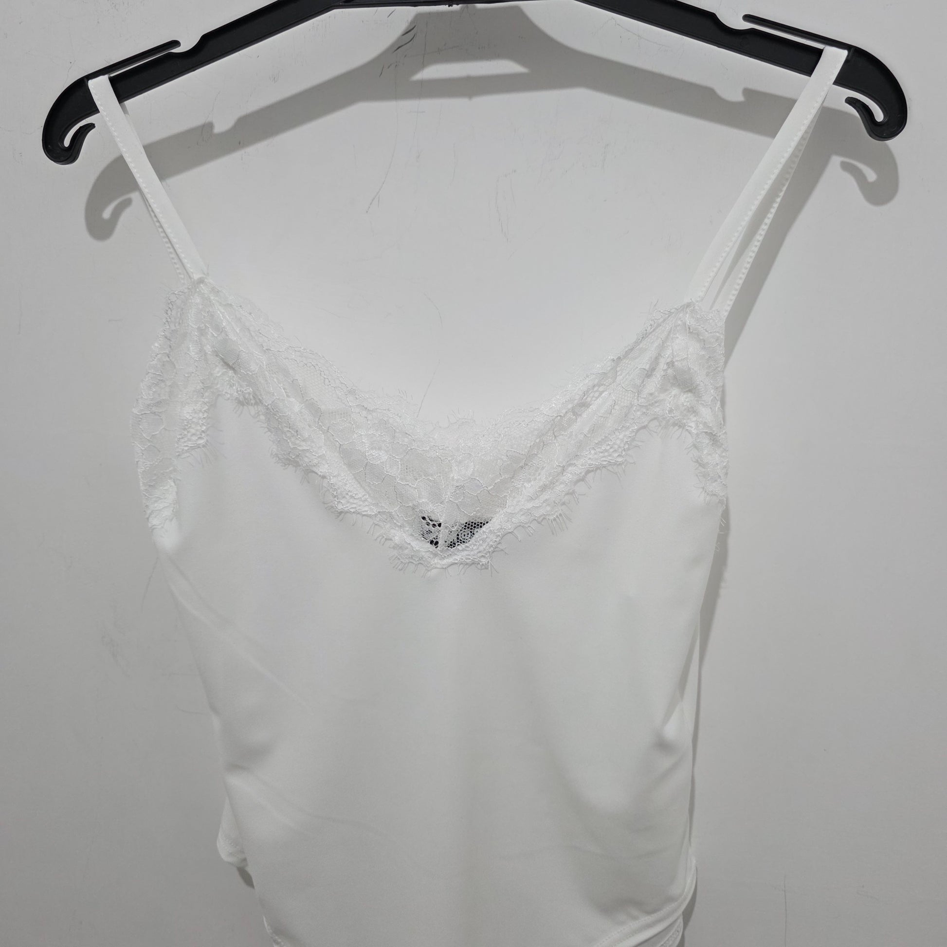 Body Nero con Dettagli in Pizzo per un Look Elegante e Seducente