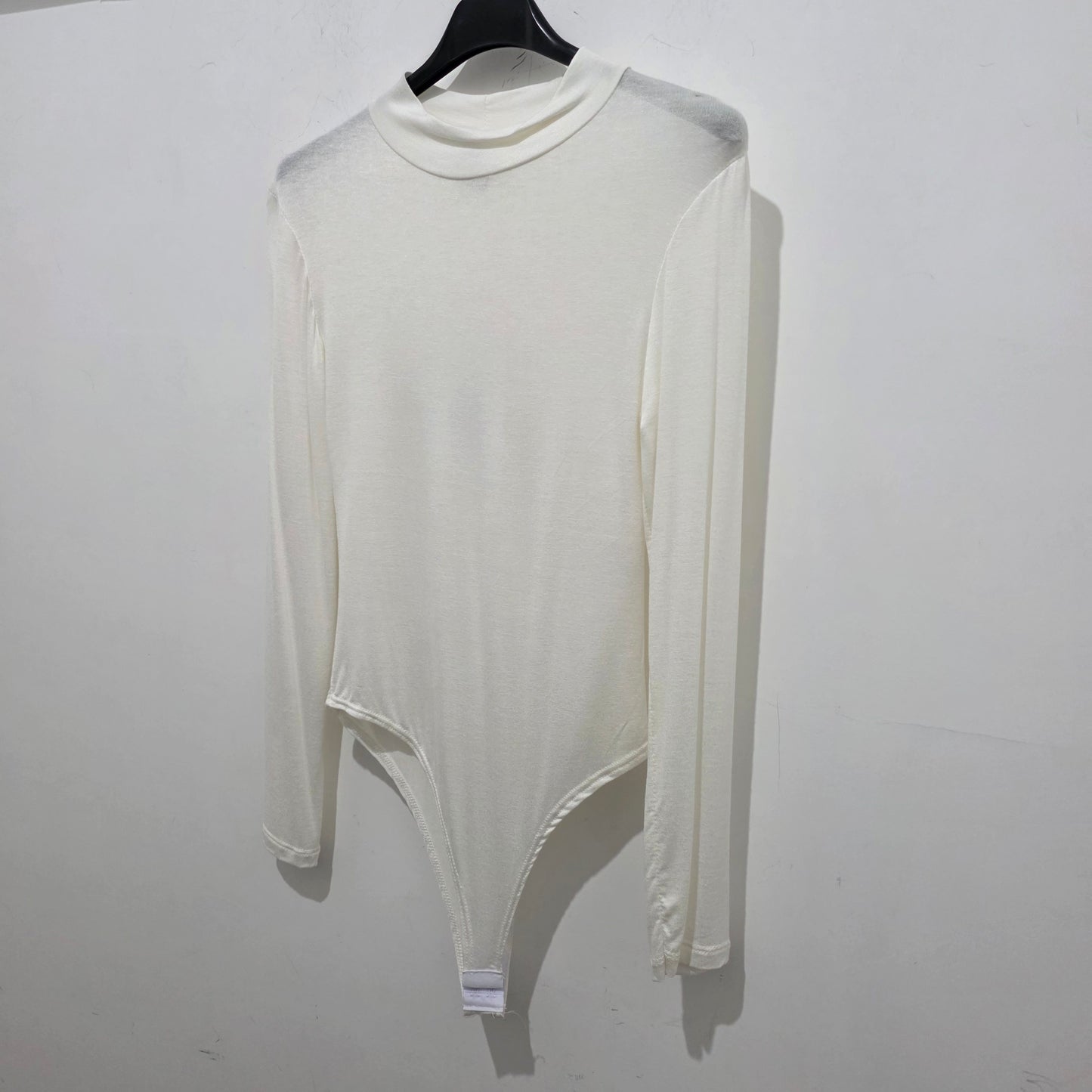 Maniche Lunghe e Collo Alto per Donna