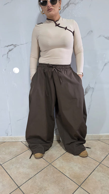 Pantaloni Neri a Gamba Larga con Cordoncino e Fiocco in Tessuto Morbido per Donna Stile Elegante e Comodo